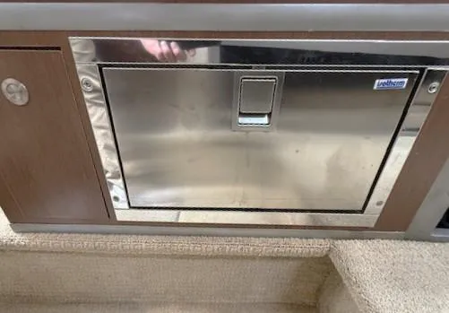 Slide: The Image of Stainless steel cabinet on 2013 Sea Ray 260 Sundancer boat interior. - 16