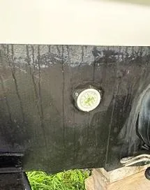 Slide: The Image of 2013 Sea Ray 260 Sundancer boat hull with visible water drainage. - 26