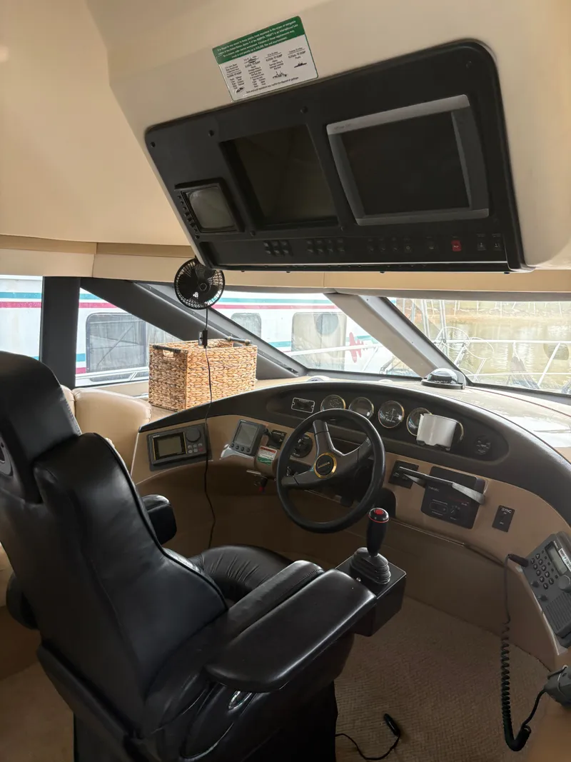 Slide: The Image of Interior of 2000 Carver 530 Voyager Pilothouse, helm view. - 13