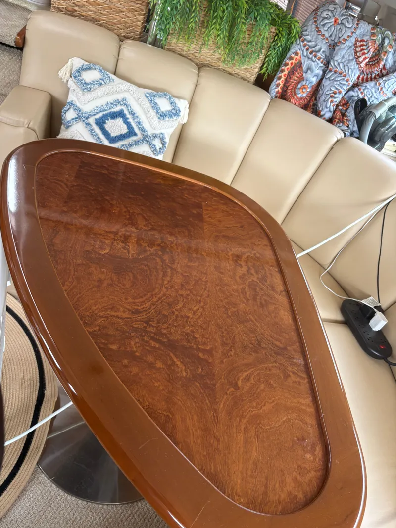 Slide: The Image of Luxurious interior of 2000 Carver 530 Voyager Pilothouse with wooden table. - 17