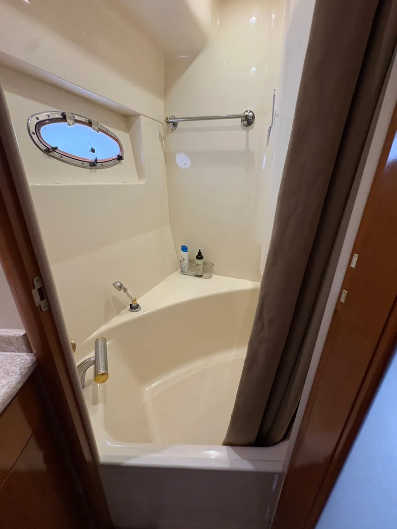 Slide: The Image of Shower in Carver 530 Voyager Pilothouse, year 2000. - 35