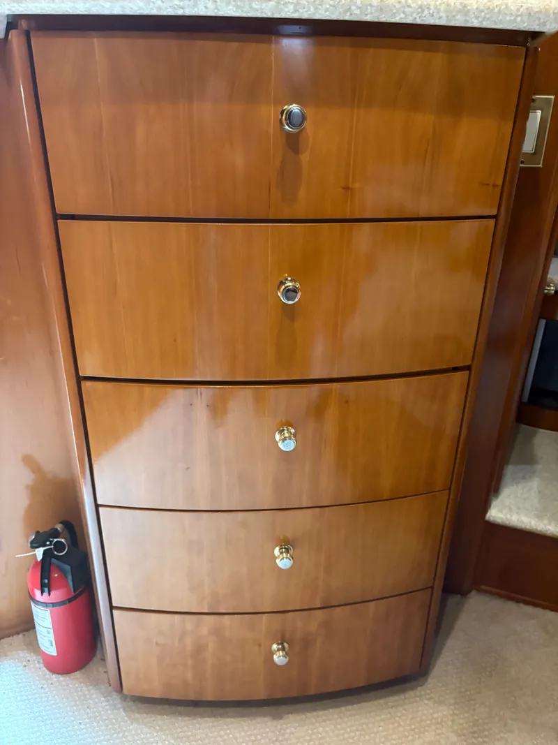 Slide: The Image of Wooden drawers in Carver 530 Voyager Pilothouse, year 2000. - 36