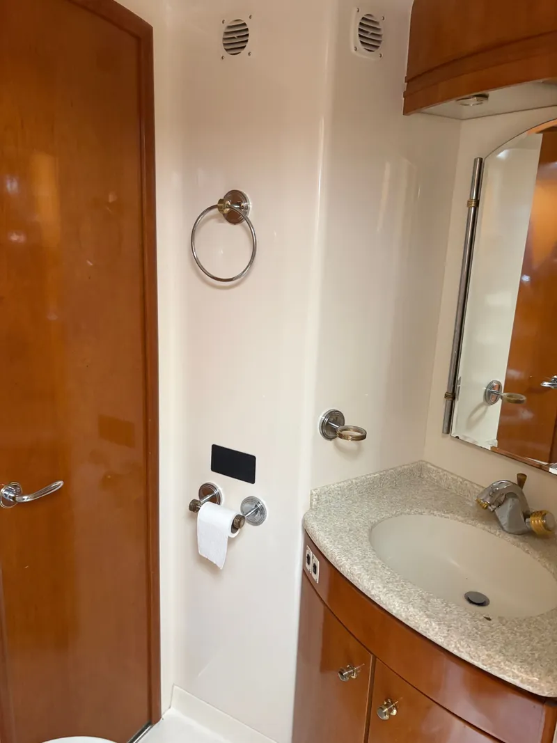 Slide: The Image of Bathroom in 2000 Carver 530 Voyager Pilothouse with wood accents. - 37