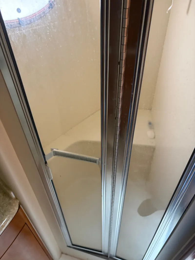 Slide: The Image of Shower in Carver 530 Voyager Pilothouse, year 2000. - 39