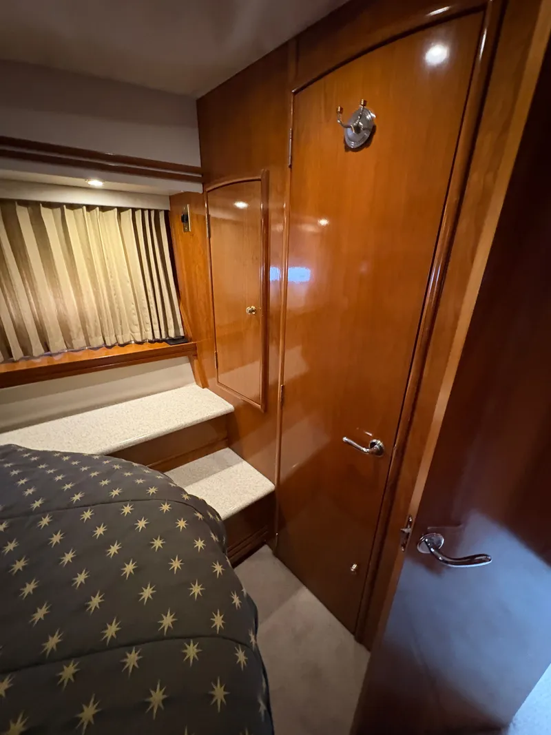 Slide: The Image of Interior of 2000 Carver 530 Voyager Pilothouse with wooden doors. - 45
