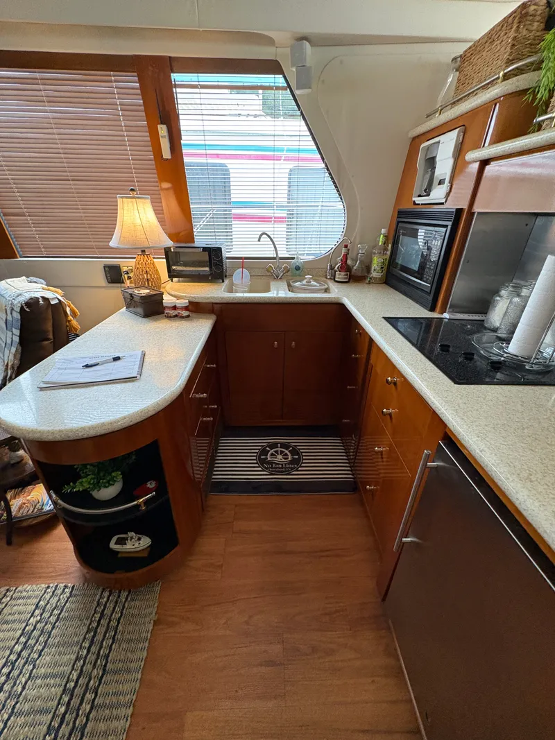 Slide: The Image of Interior of Carver 530 Voyager Pilothouse yacht kitchen, year 2000. - 9