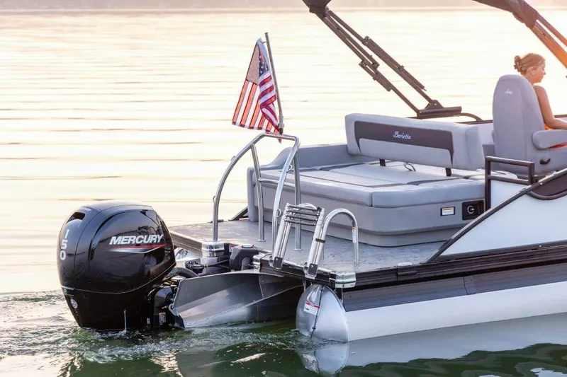 Slide: The Image of Manufacturer Provided Image: 2026 Barletta ARIA 22UC pontoon boat with Mercury engine on calm water. - 10