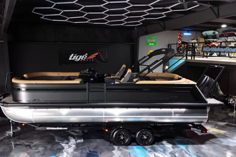 Slide: The Image of 2026 Viaggio Lago Z-U 24 pontoon boat displayed indoors on a trailer. - 18
