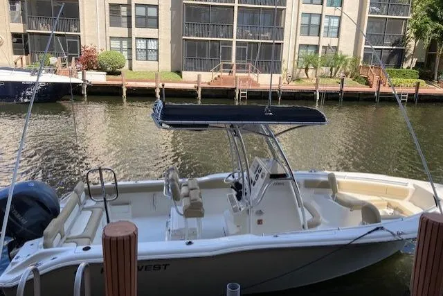 Slide: The Image of 2017 Key West 239 FS boat docked by waterfront apartments. - 3