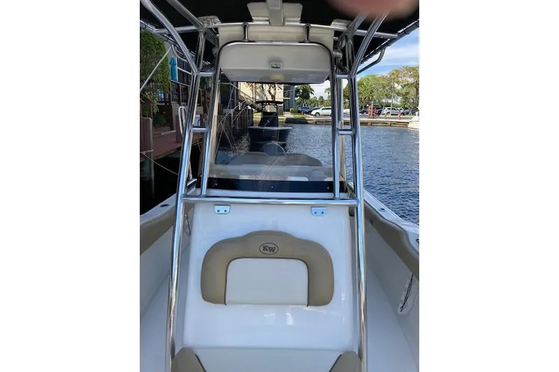 Slide: The Image of 2017 Key West 239 FS boat interior with seating and stainless steel frame. - 7