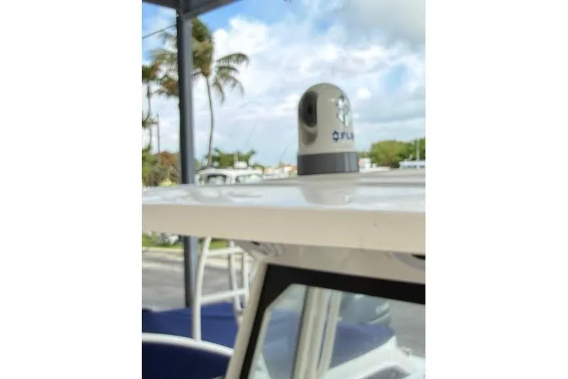 Slide: The Image of Hydraulic steering system on a 2022 Pursuit S 268 Sport boat, featuring SeaStar components. - 20