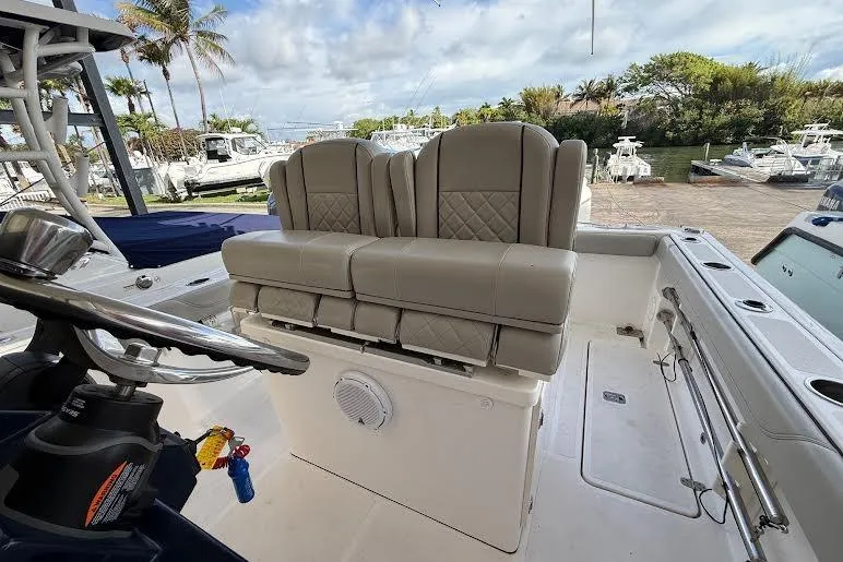 Slide: The Image of Close-up of Yamaha LF200XCA engine label on 2022 Pursuit S 268 Sport boat. - 26