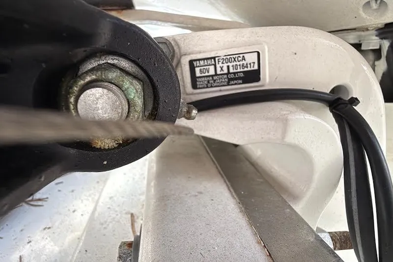 Slide: The Image of Manufacturer Provided Image: 2022 Pursuit S 268 Sport boat interior with white seating and table. - 35