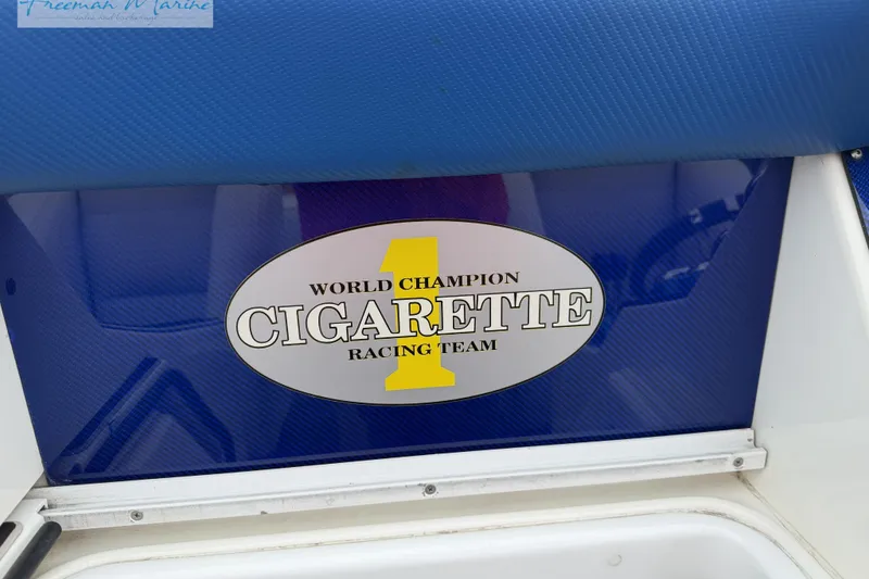 Slide: The Image of World Champion Cigarette Racing Team logo on 2000 Cigarette 30' Mystique boat. - 17
