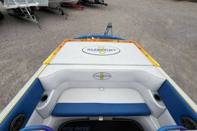 Slide: The Image of 2000 Cigarette 30' Mystique boat interior with white and blue seating. - 36