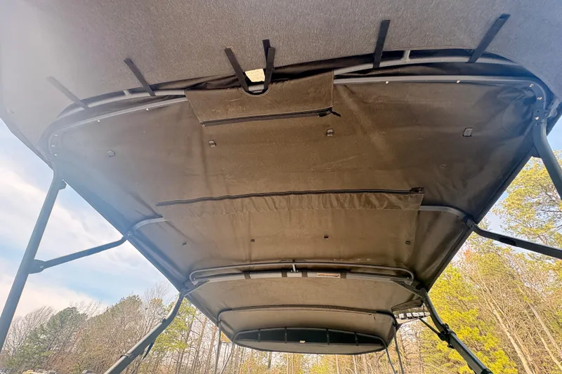 Slide: The Image of 2022 Sea Doo Switch canopy viewed from below, showcasing sturdy frame and fabric. - 11