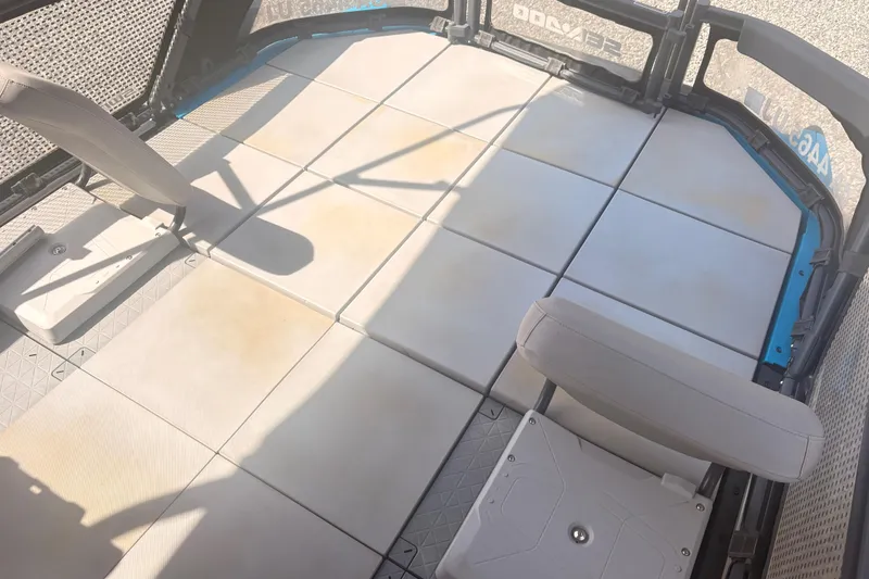 Slide: The Image of Interior of a 2022 Sea Doo Switch with modular seating and flooring. - 8