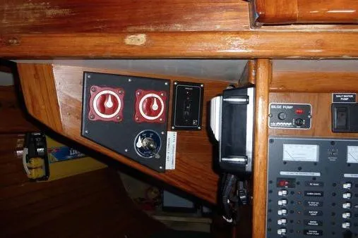 Slide: The Image of Control panel of a 1987 Cape Dory 36 sailboat with switches and gauges. - 42