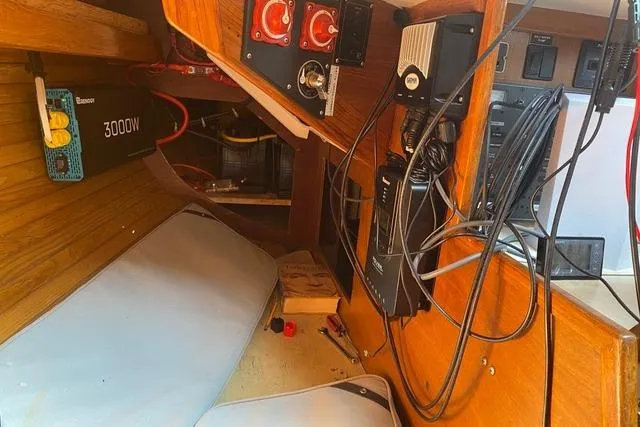 Slide: The Image of Interior of a 1987 Cape Dory 36 sailboat showing electrical equipment and wiring. - 43
