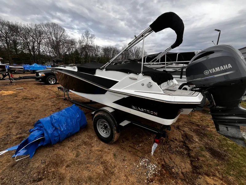 The Image of 2021 Glastron GTD 180 boat with Yamaha engine parked outdoors. - 1