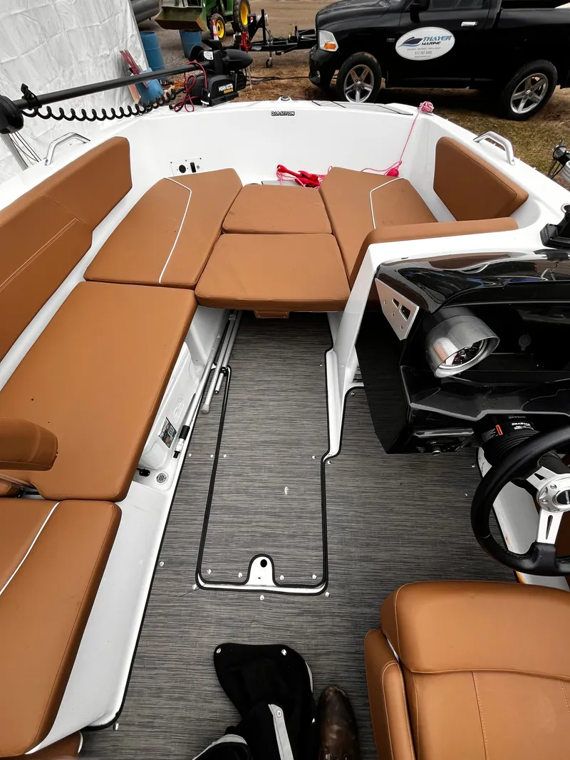 Slide: The Image of Interior of a 2021 Glastron GTD 180 boat with brown seating. - 3
