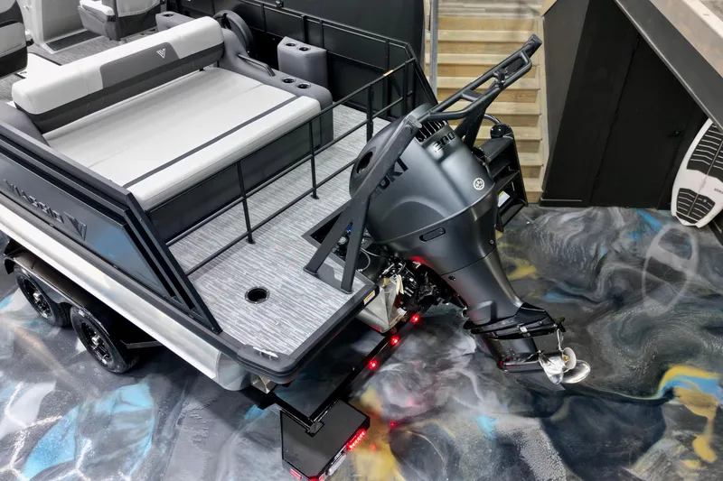 Slide: The Image of Viaggio Lago X-S 22 boat, 2026 model, featuring sleek design and powerful outboard motor. - 11