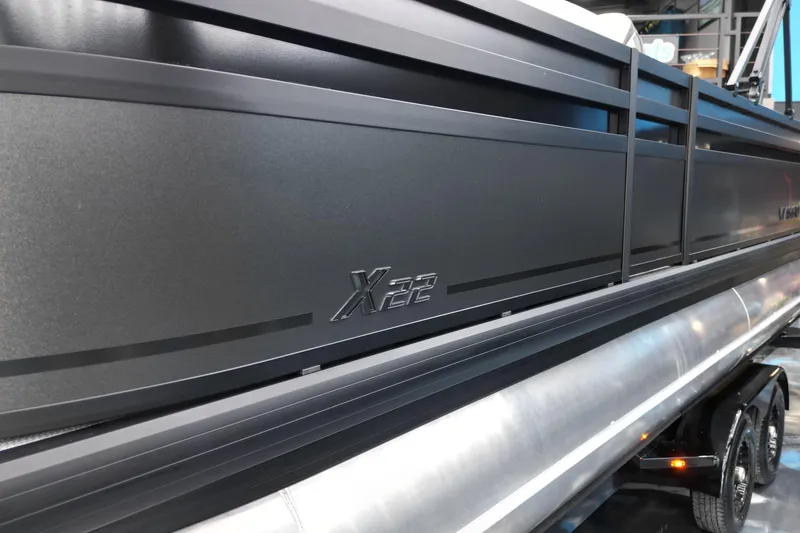 Slide: The Image of 2026 Viaggio Lago X-S 22 pontoon boat, sleek black design, side view. - 17