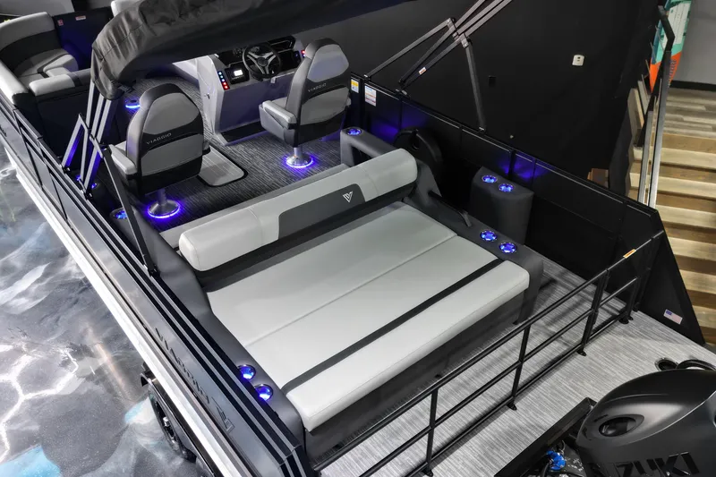 Slide: The Image of Luxurious 2026 Viaggio Lago X-S 22 boat interior with modern seating and ambient lighting. - 2