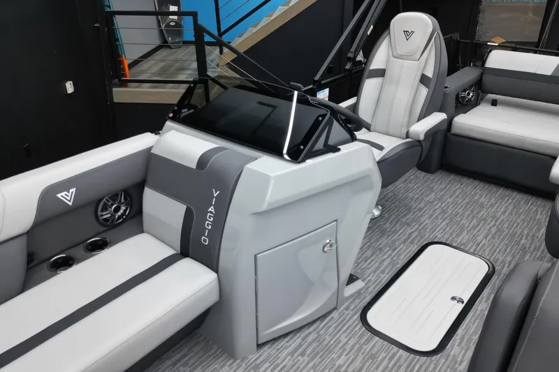 Slide: The Image of Interior of 2026 Viaggio Lago X-S 22 boat with modern seating and control panel. - 22