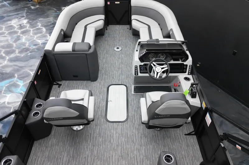 Slide: The Image of 2026 Viaggio Lago X-S 22 boat interior with modern seating and steering console. - 26