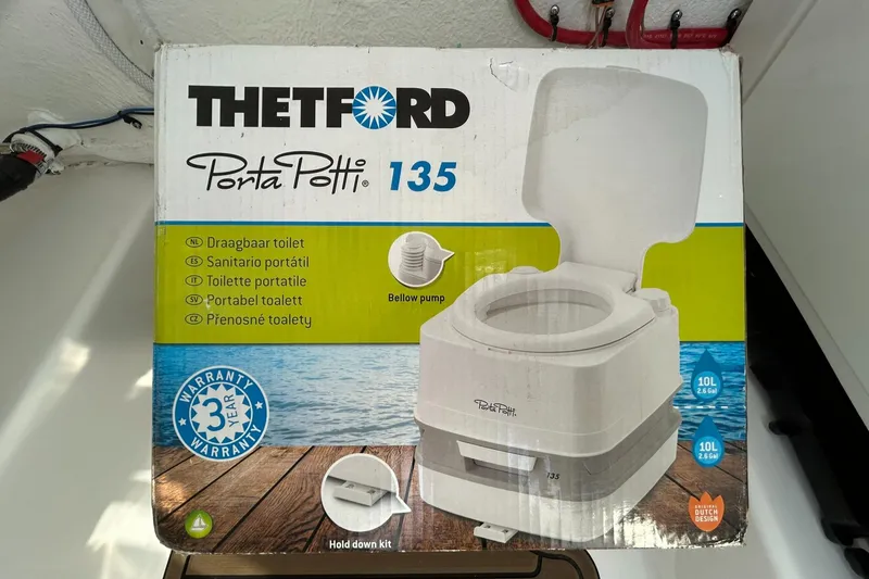 Slide: The Image of Thetford Porta Potti 135 portable toilet box on a Tidewater 232 LXF boat. - 21