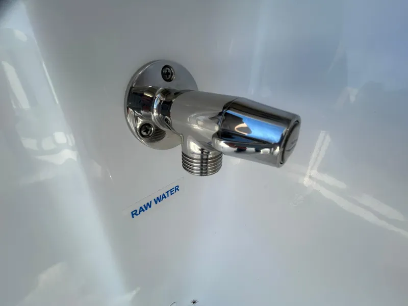 Slide: The Image of Chrome raw water outlet on 2025 Tidewater 232 LXF boat. - 40