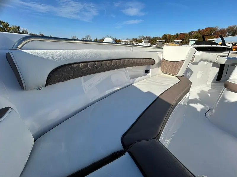Slide: The Image of 2025 Tidewater 232 LXF boat interior with sleek seating and modern design. - 8