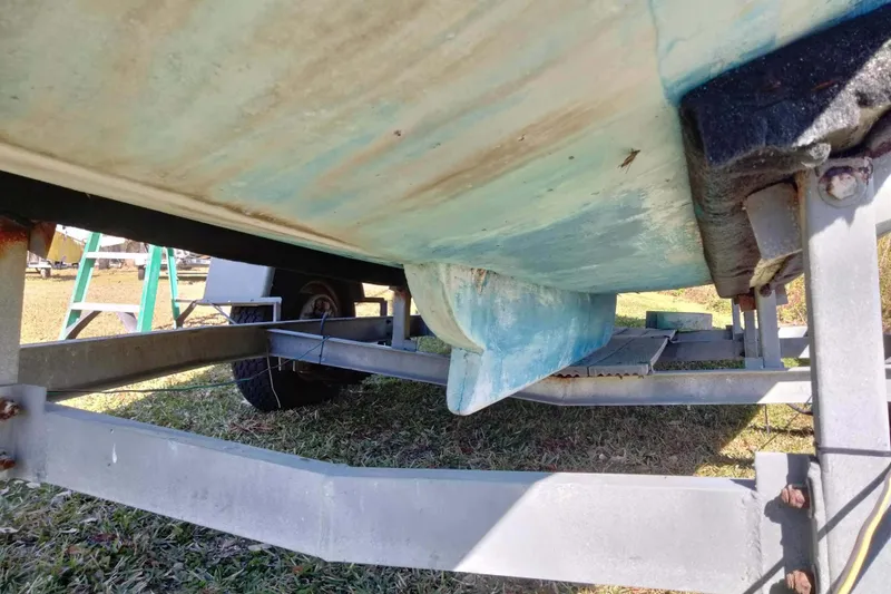 Slide: The Image of Underside view of a 1998 Hunter 240 sailboat on a trailer. - 22