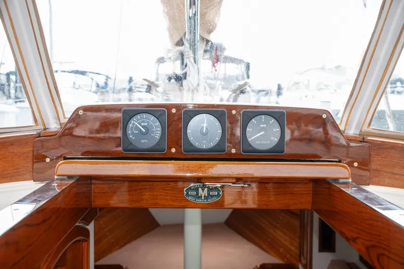 Slide: The Image of Cockpit of 2011 Morris M42 sailboat with wooden finish and navigation instruments. - 17