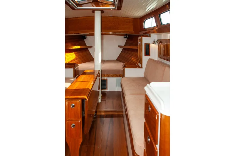 Slide: The Image of Luxurious 2011 Morris M42 yacht interior with polished wood and cozy seating. - 21