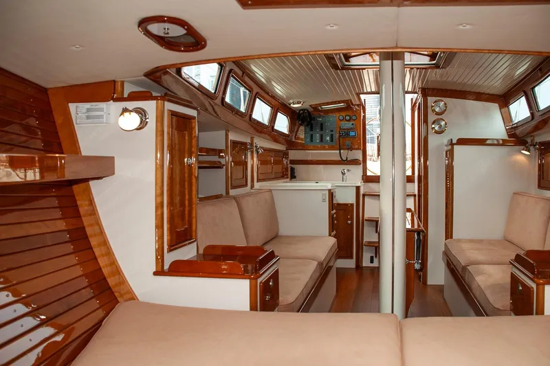 Slide: The Image of Luxurious 2011 Morris M42 yacht interior with elegant wood finishes and comfortable seating. - 27