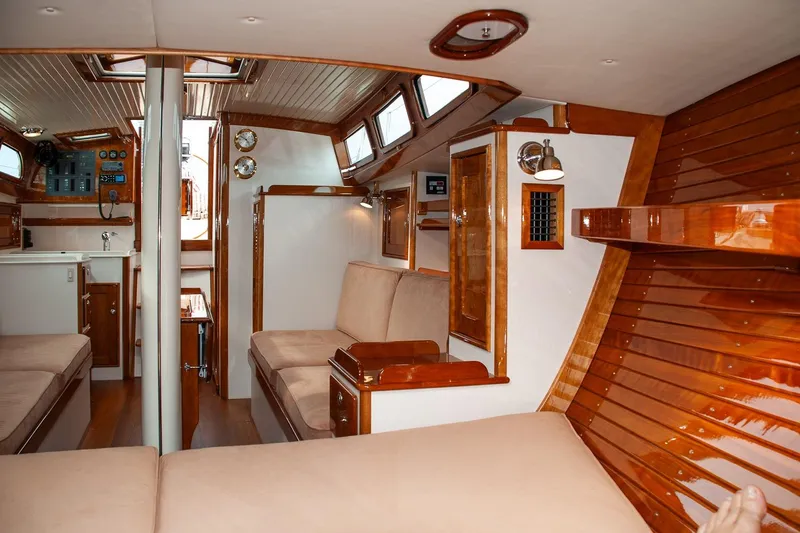 Slide: The Image of Luxurious interior of a 2011 Morris M42 yacht with polished wood and cozy seating. - 29