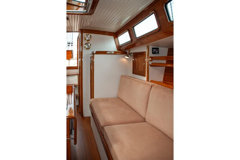 Slide: The Image of Interior of 2011 Morris M42 yacht with beige seating and wooden accents. - 31