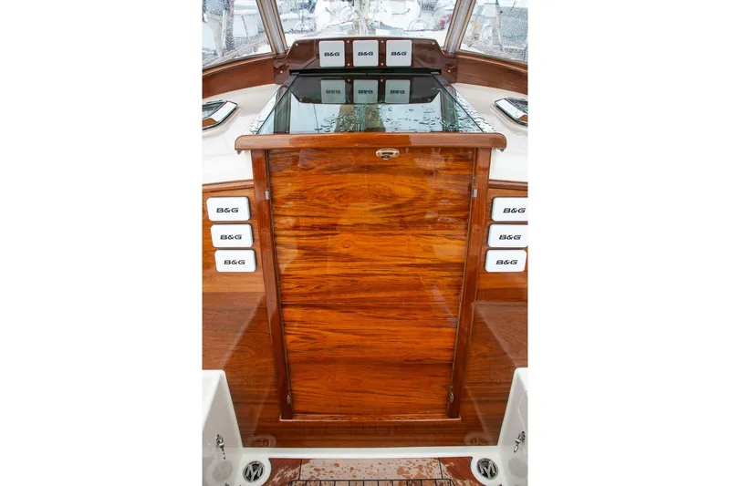 Slide: The Image of Wooden helm station of a 2011 Morris M42 yacht with B&G navigation equipment. - 38