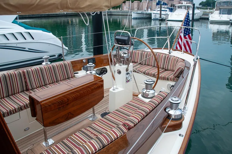 Slide: The Image of Luxurious 2011 Morris M42 sailboat interior with striped seating and polished wood finish. - 8