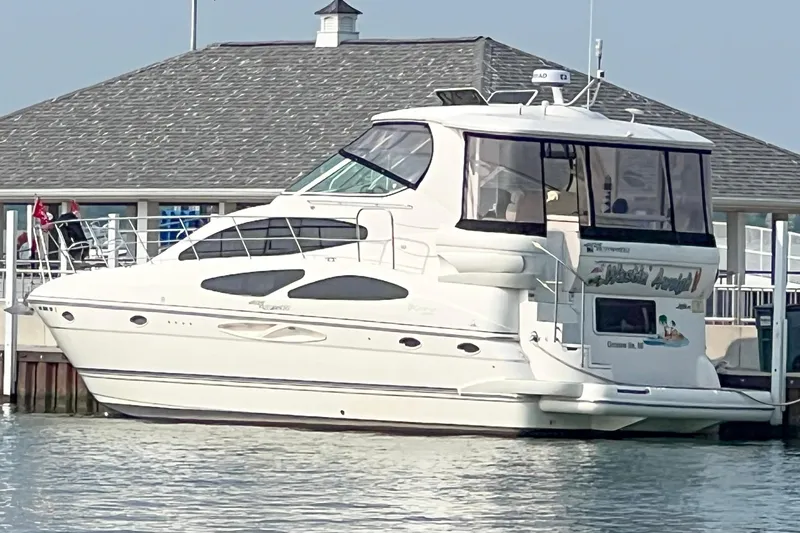 The Image of 2005 Cruisers Yachts 405 Express Motoryacht docked at marina. - 0