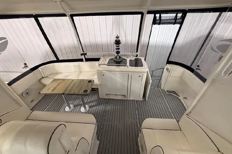 Slide: The Image of Luxurious interior of 2005 Cruisers Yachts 405 Express Motoryacht with seating and kitchenette. - 16