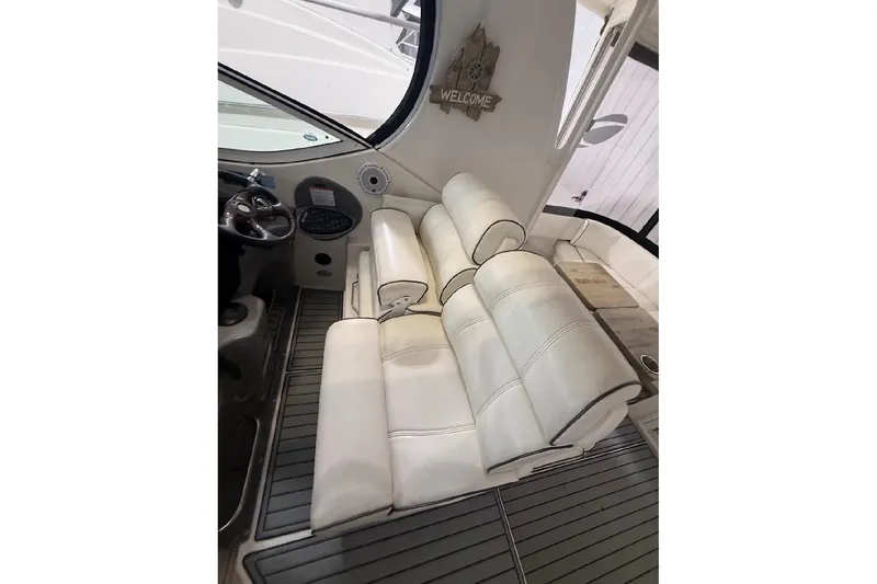 Slide: The Image of Luxurious interior of 2005 Cruisers Yachts 405 Express Motoryacht with white leather seating. - 19