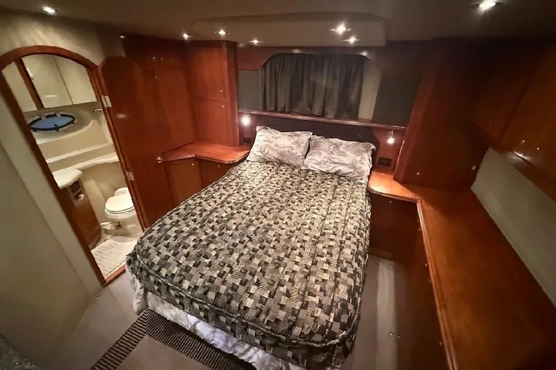 Slide: The Image of Luxurious bedroom in 2005 Cruisers Yachts 405 Express Motoryacht with ensuite bathroom. - 30
