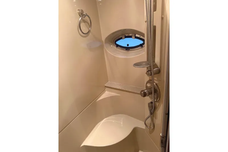 Slide: The Image of Shower area in 2005 Cruisers Yachts 405 Express Motoryacht with porthole window. - 39