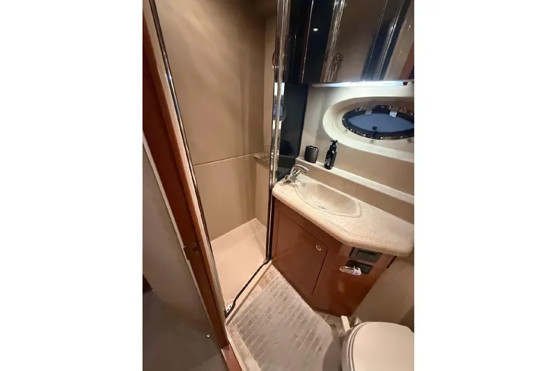 Slide: The Image of Luxurious bathroom in 2005 Cruisers Yachts 405 Express Motoryacht with shower and vanity. - 48