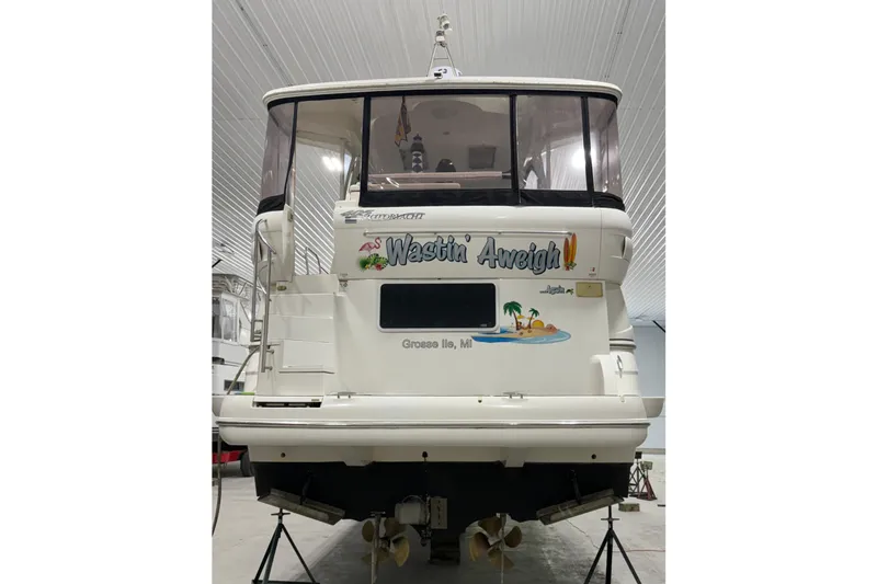 Slide: The Image of 2005 Cruisers Yachts 405 Express Motoryacht in storage, rear view. - 5