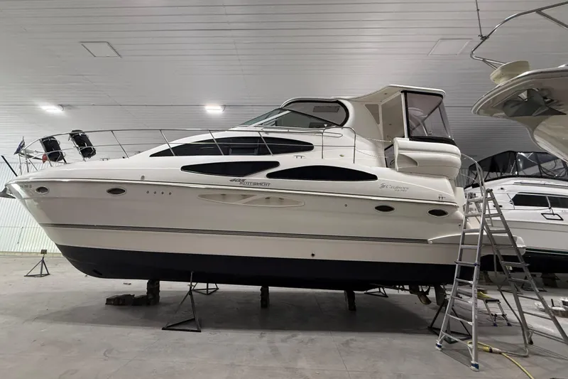 Slide: The Image of 2005 Cruisers Yachts 405 Express Motoryacht in indoor storage, side view. - 6