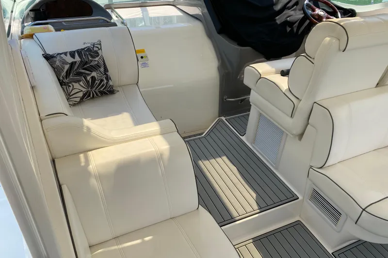 Slide: The Image of Luxurious interior of 2005 Cruisers Yachts 405 Express Motoryacht with plush seating and decorative pillow. - 7